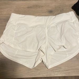 White Lululemon size 4 speed ups 2.5 inch